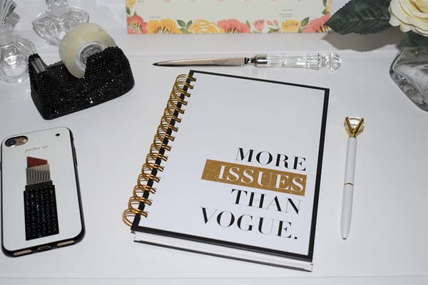 Spiral Journal: 'More Issues Than Vogue' White with black edge, angled view