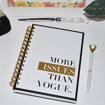 Spiral Journal: 'More Issues Than Vogue' White with black edge, zoomed in